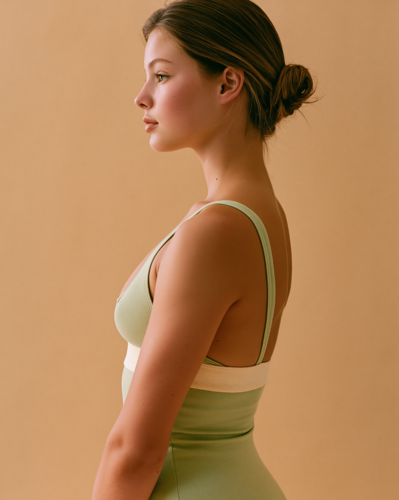 Pistachio bralette with contrast cream waistband — studio profile